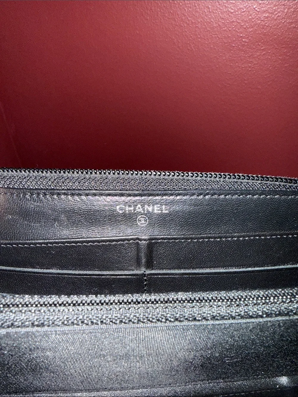 CHANEL Black Quilted Zip Wallet with CC Hardware